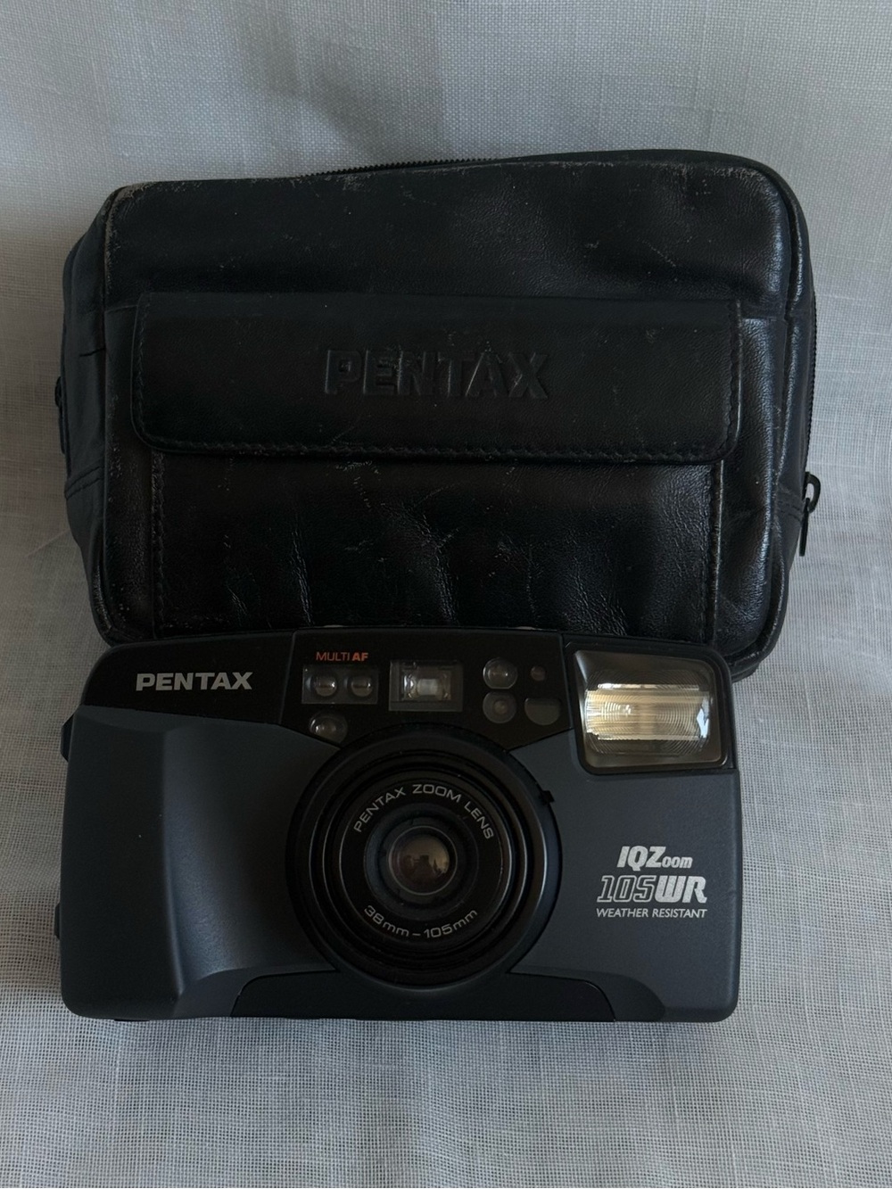 Pentax Black Compact Point-and-Shoot Film Camera with Black Case